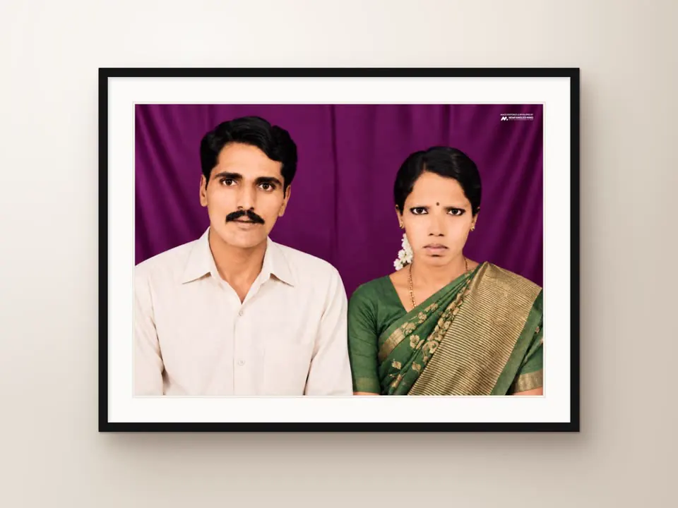 Restored couple's photograph, black frame