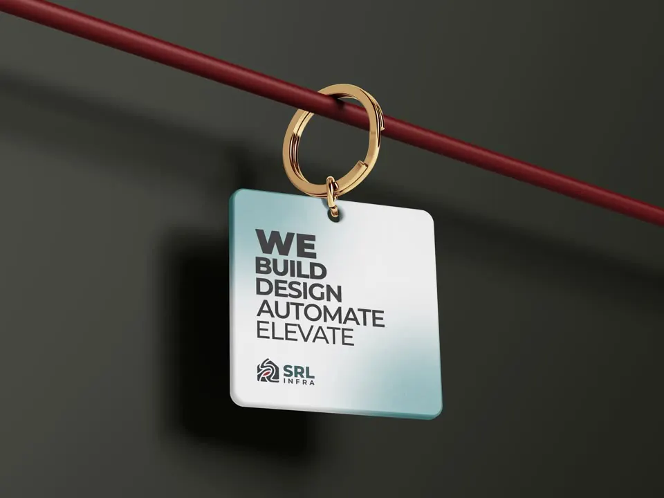 "We build, design, automate, elevate" key tag